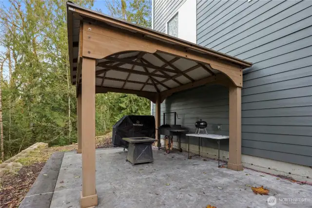 Stairs from deck located near the slider lead to this added concrete pad that is hot tub ready (wired and ready to go)