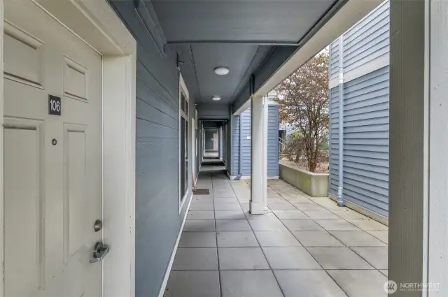 Covered entrance to condo