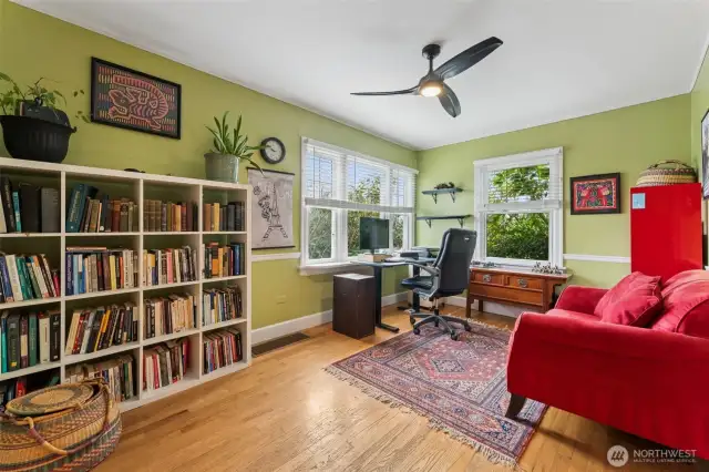 This front room makes a great office, with plenty of windows facing the front of the property