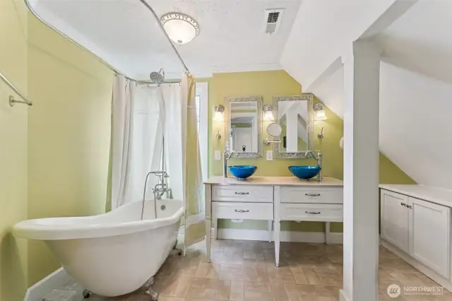 Primary ensuite bath with clawfoot tub/shower and double vanity