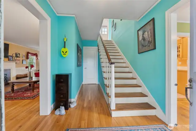 Spacious entry with hardwood flooring