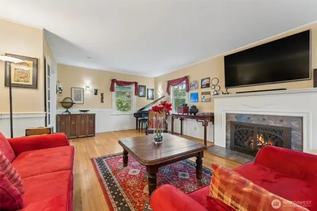 Cozy gas fireplace with handsome surround