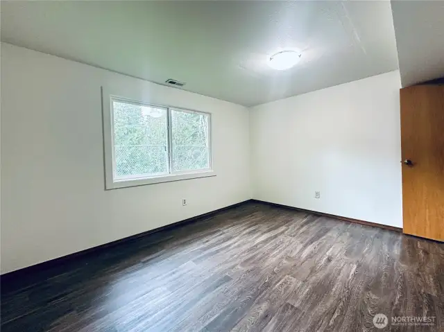 Fourth bedroom on lower floor with 3/4 bathroom