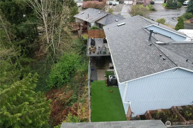 Fenced back area, property extends beyond the current fence