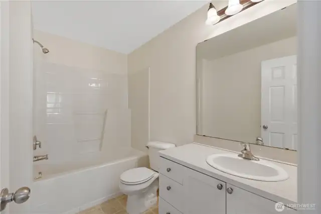 Full guest bath on top level w/ freshly painted cabinets