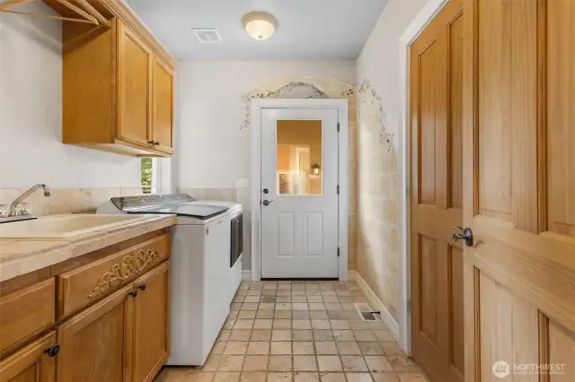 Utility room is when you enter from the porte cochere