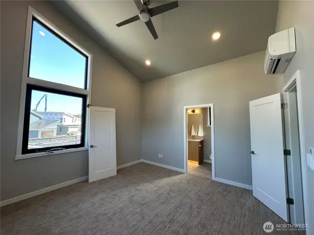 Primary Bedroom with Vaulted Ceiling, Ceiling Fan & Tons of Natural Light