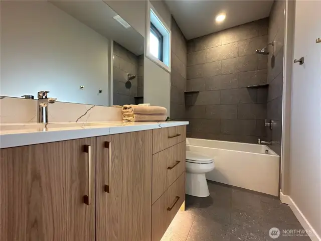 Upstairs Guest Bathroom with Filed Tub Shower