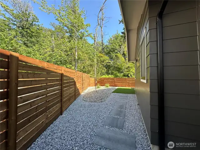 Fully Fenced Backyard with Two Gates