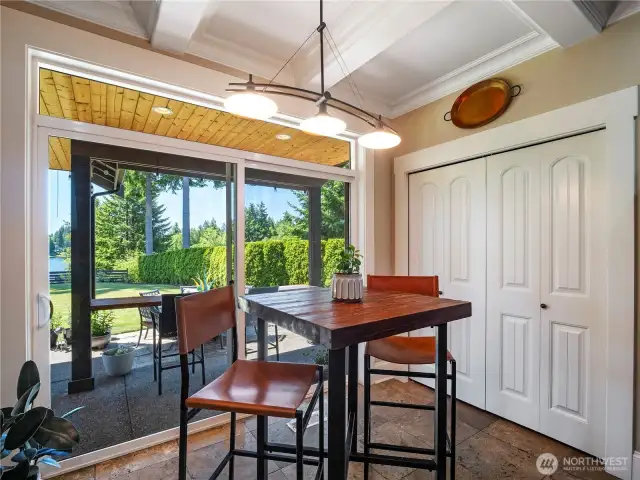 Kitchen nook with beautiful views of the lake...pantry in the background.