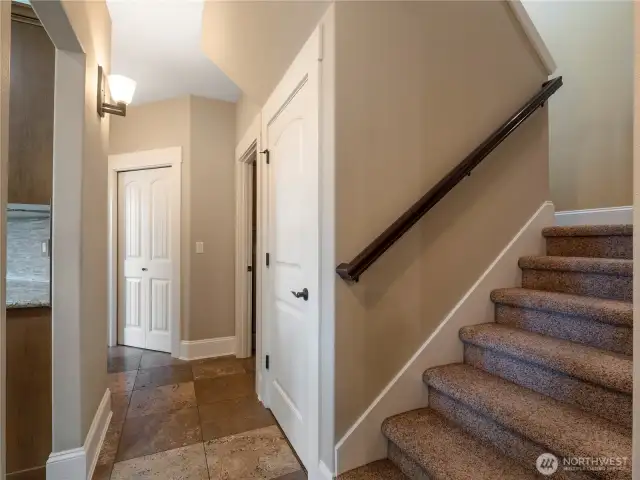 The stairs lead up to the finished space above the garage.