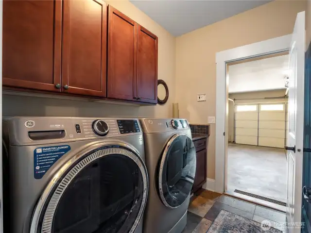 Utility room with cabinets & counter space...the washer and dryer are negotiable.