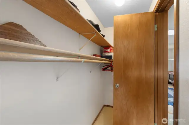 Walk in closet plus unfinished storage space through the door.