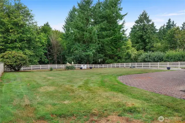 Close to an acre of property.  The fenced area has a garden space that was used in years past.