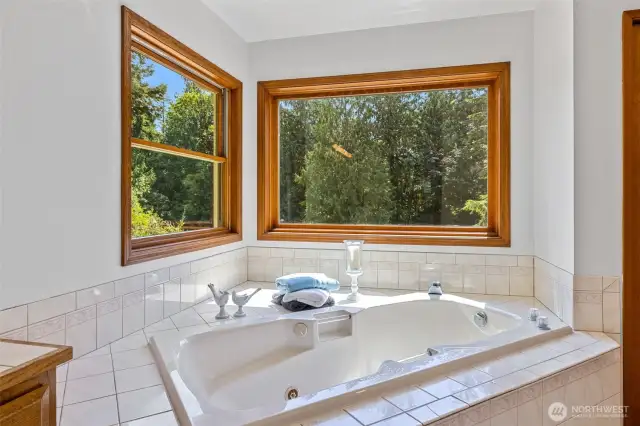 Lavish Primary Bath with jetted soaking tub