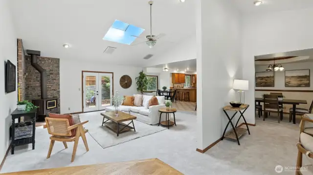 Upon entering this home you are greeted by an abundance of natural light & beautiful cathedral ceilings truly elevating this space.