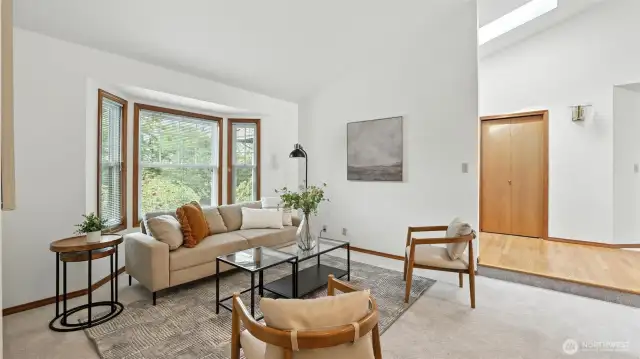 This inviting flex space offering large bay windows & a skylight is perfect for a formal sitting space, reading nook or home office!