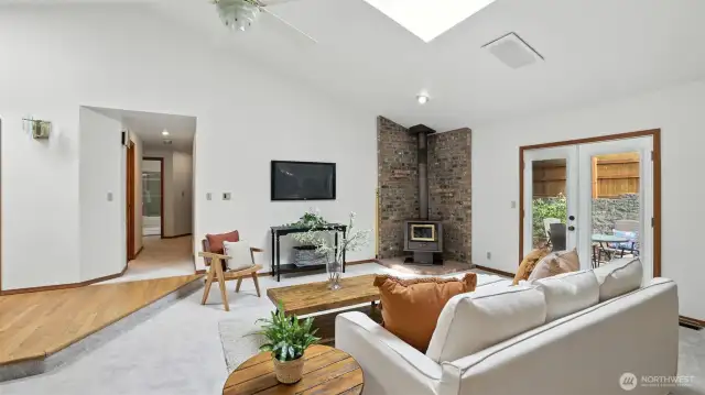 Abundant natural light pours in through the skylights, creating a bright and airy atmosphere.