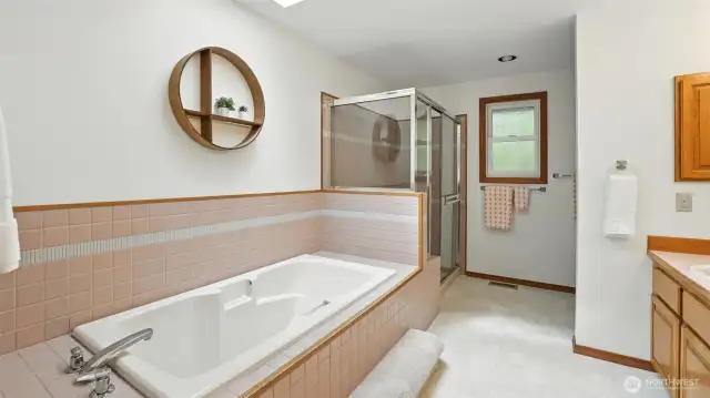 Enjoy this 5 piece master bath with deep soaking tub & separate stand up water closet.