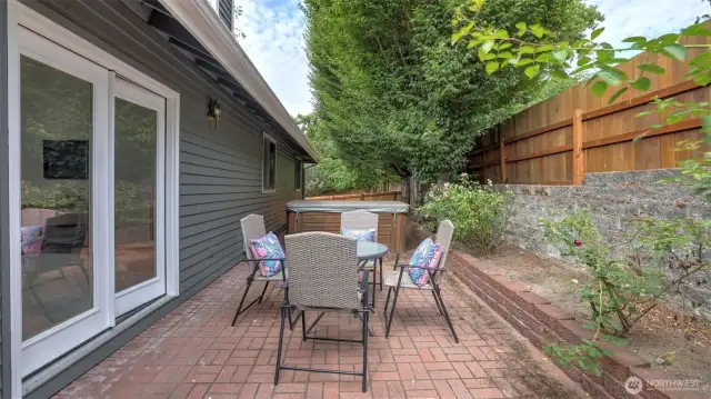 This back patio is perfect for a quiet time alone or hosting gatherings!
