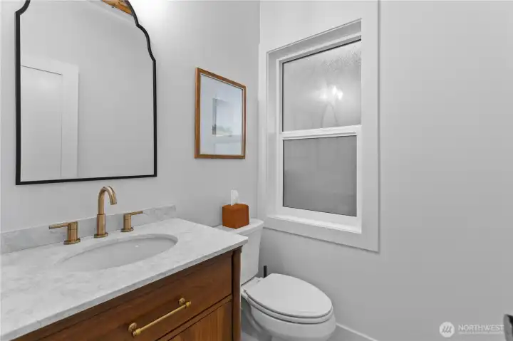 Lower level powder room.