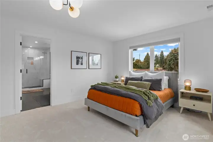 The primary features a spa-like ensuite bathroom.
