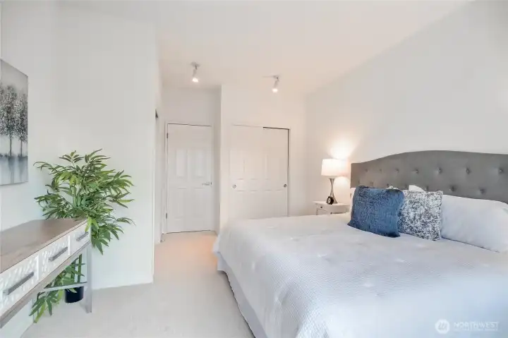 Bedroom with two closets, private door to patio, nice window space and high ceilings.