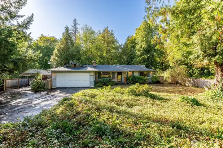A wee it larger than a .3 acre parcel, hosts this 3 bed/1.75 bath home