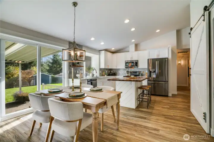 Generous sliders to the extended covered patio for quiet time be it sun or rain.