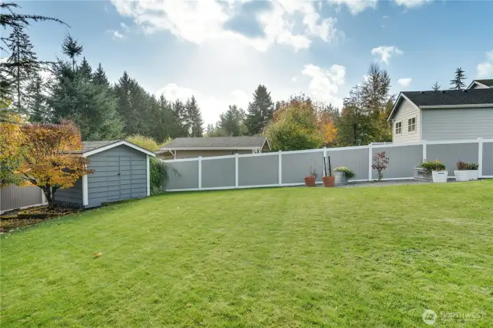 Extra shed for gardening, toys, or projects!  And this home is fully fenced.