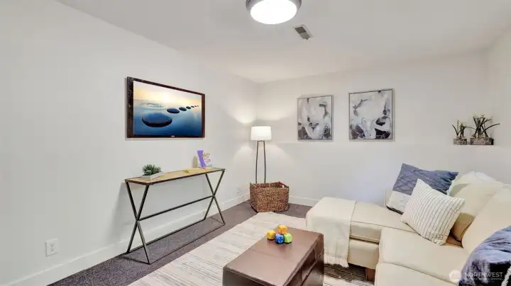 This flexible space is ready to be customized- ideal for work, play or relaxation.