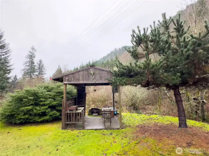 Shed with firepit overlooking Lake Creek