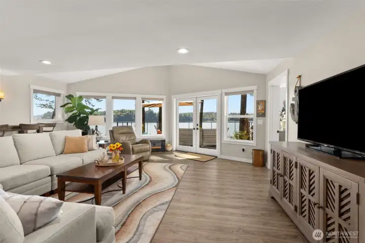 Spacious living room with saltwater views.