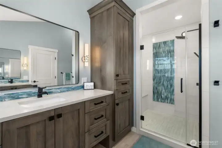 Custom cabinets and sensational shower