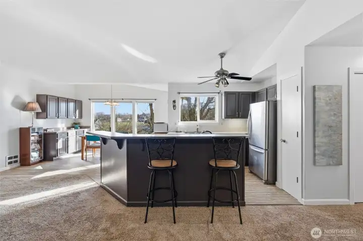 Kitchen has all new stainless appliances and a breakfast bar.