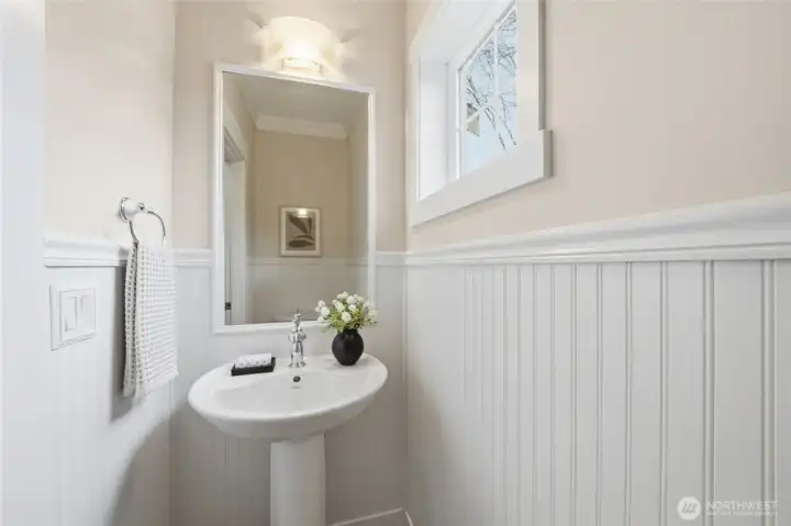 The main floor has a guest bathroom, half-bath.