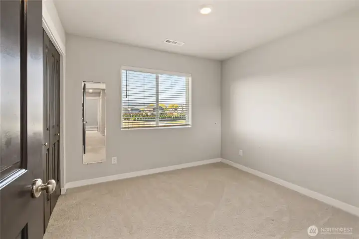 Upper-level bedroom 1