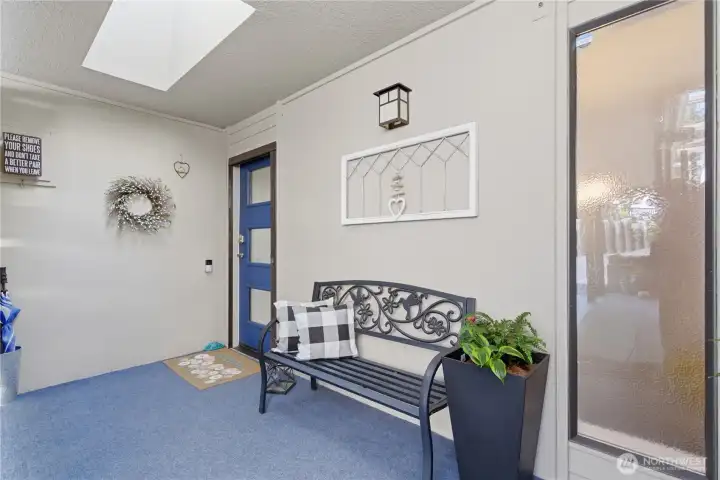 Welcoming, covered entry creates a private arrival space—perfect for staying dry while unlocking the door and greeting guests out of the elements.