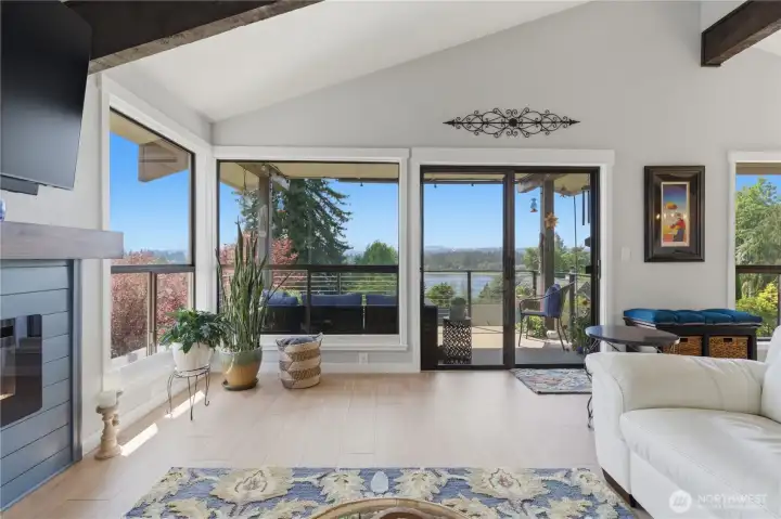Upper covered deck—an inviting spot to relax with a book or take in stunning sunsets while enjoying the comfort of a sheltered outdoor space.