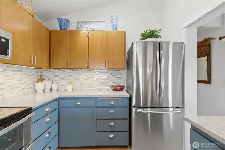 Beautiful backsplash adds the perfect finishing touch—complementing the cabinetry and appliances while bringing texture and style to the kitchen.