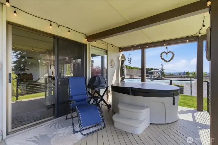 Private lower-level hot tub—perfect for unwinding and taking in those beautiful sunset moments. Thoughtfully maintained with a new cover, replaced circuit board, updated control panel, and a new pump for added peace of mind.