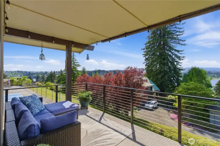 Another view of the main deck—showcasing the inviting outdoor space and its beautiful surroundings.