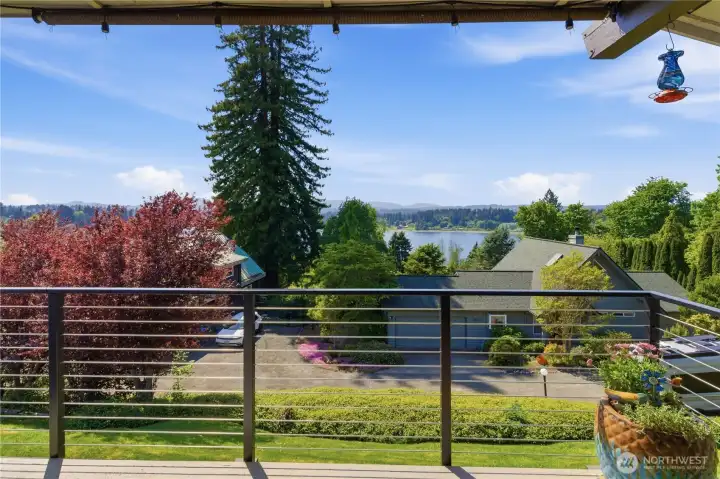 Enjoy the view from the main deck—an inviting outdoor space to relax, unwind, and take in the surrounding scenery.