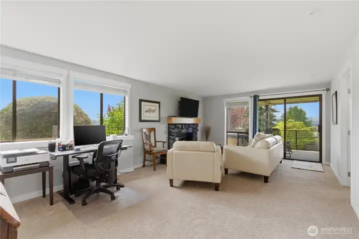 Spacious lower-level living room offers plenty of room to add a dedicated workspace—perfect for setting up your computer while still enjoying a comfortable living area.