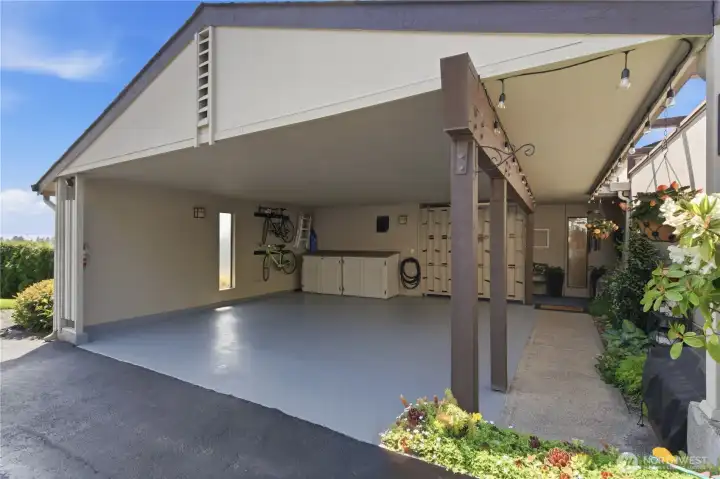 Freshly repainted carport with a clean, updated surface—ready to comfortably accommodate two vehicles and keep them protected year-round.