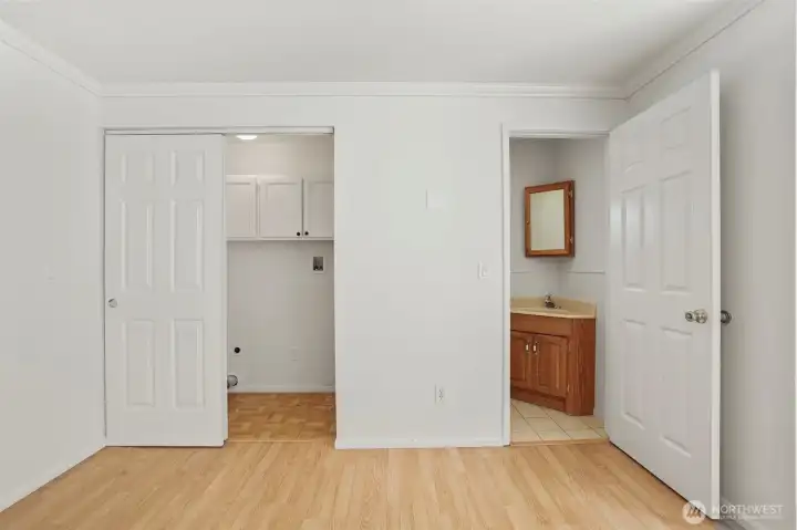 Utility space and half bathroom off of the bonus room.