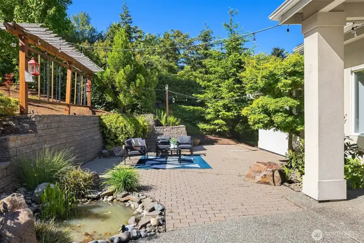 West facing courtyard is great for warm evenings. Listen to the frogs from the pond. :) Pond with water fall is clear now.