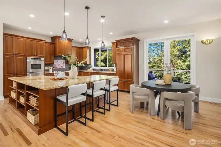 Kitchen opens up to the back deck.