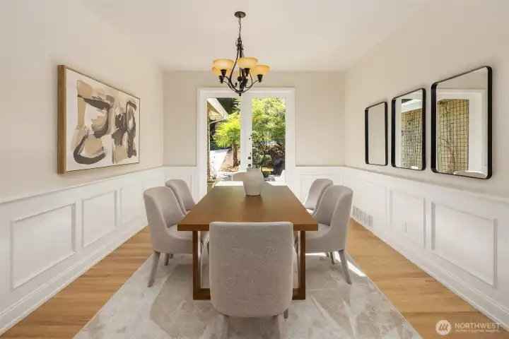French doors open up to the front courtyard. This house flows for entertaining.