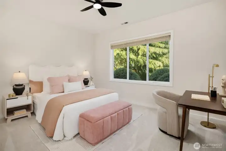 One of 3 lower level bedrooms. tall ceilings and big windows.